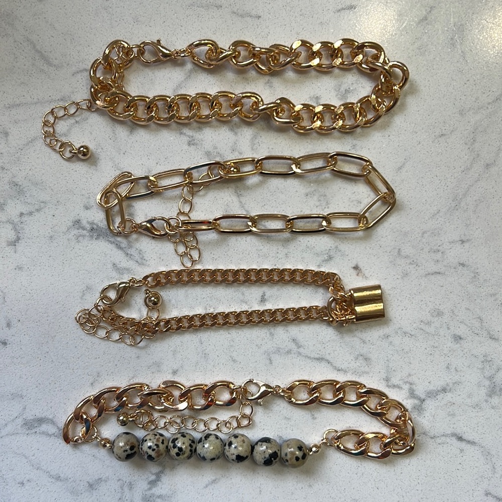 Set of 4 gold bracelets